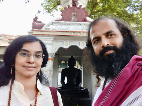 In front of Mavelikkara Buddha, a 9th century Buddha statue in Kerala